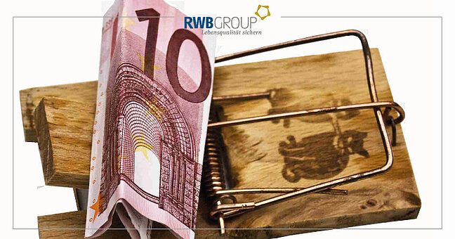eine Mausefalle und ein 10-Euro-Geldschein